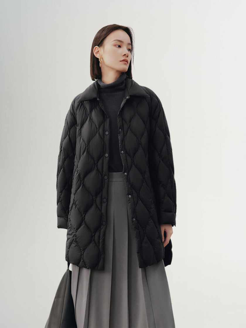 Black quilted hooded jacket with pattern