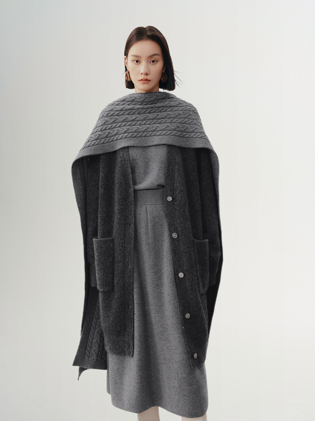 Dark gray sheepskin cardigan with puffed sleeves and V-neck