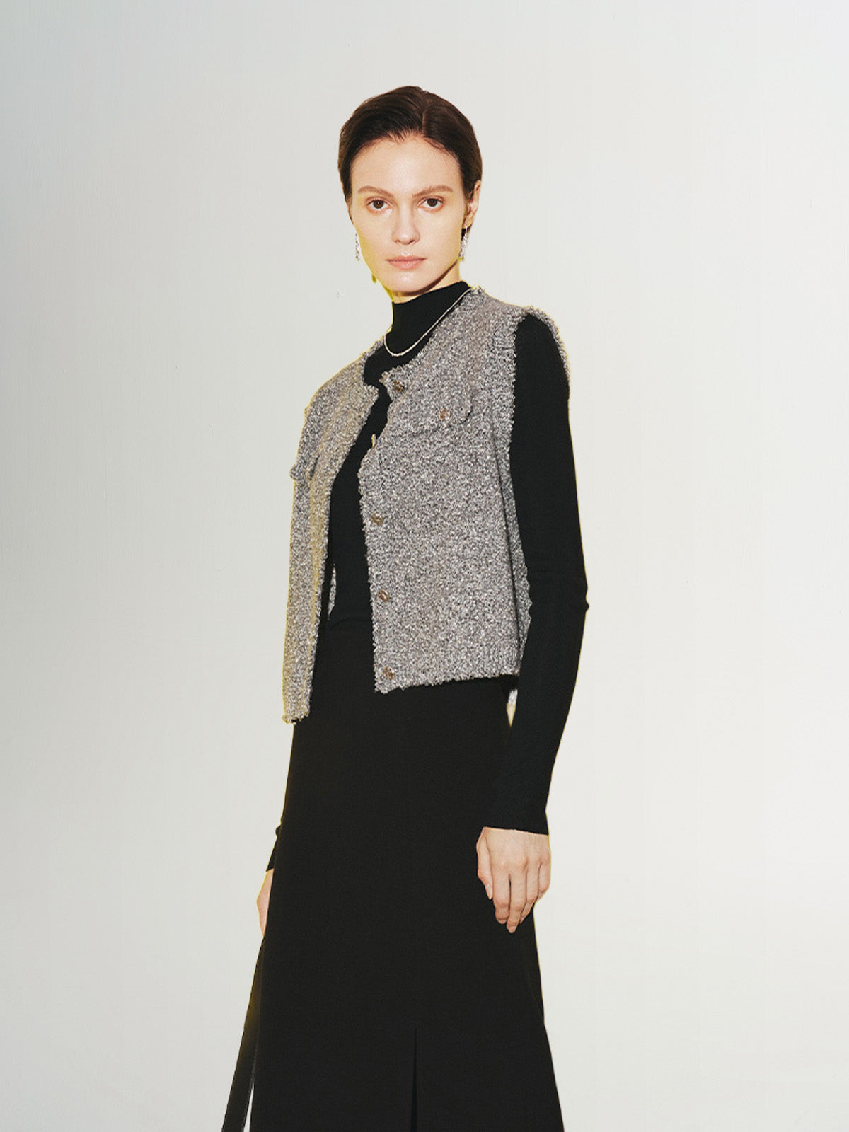 Tweed sleeveless vest
