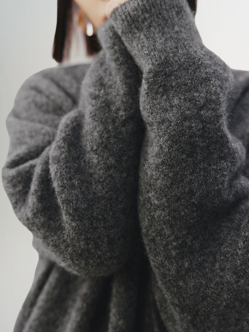Dark gray sheepskin cardigan with puffed sleeves and V-neck