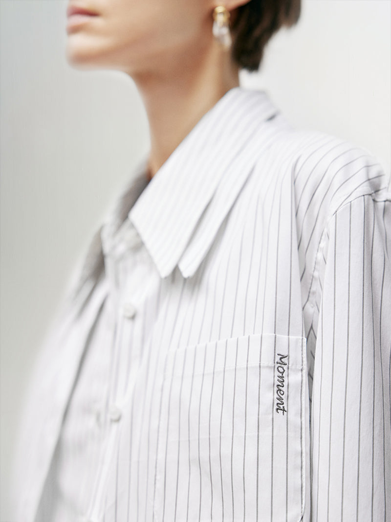 White striped shirt with classic collar and long sleeves with button-down