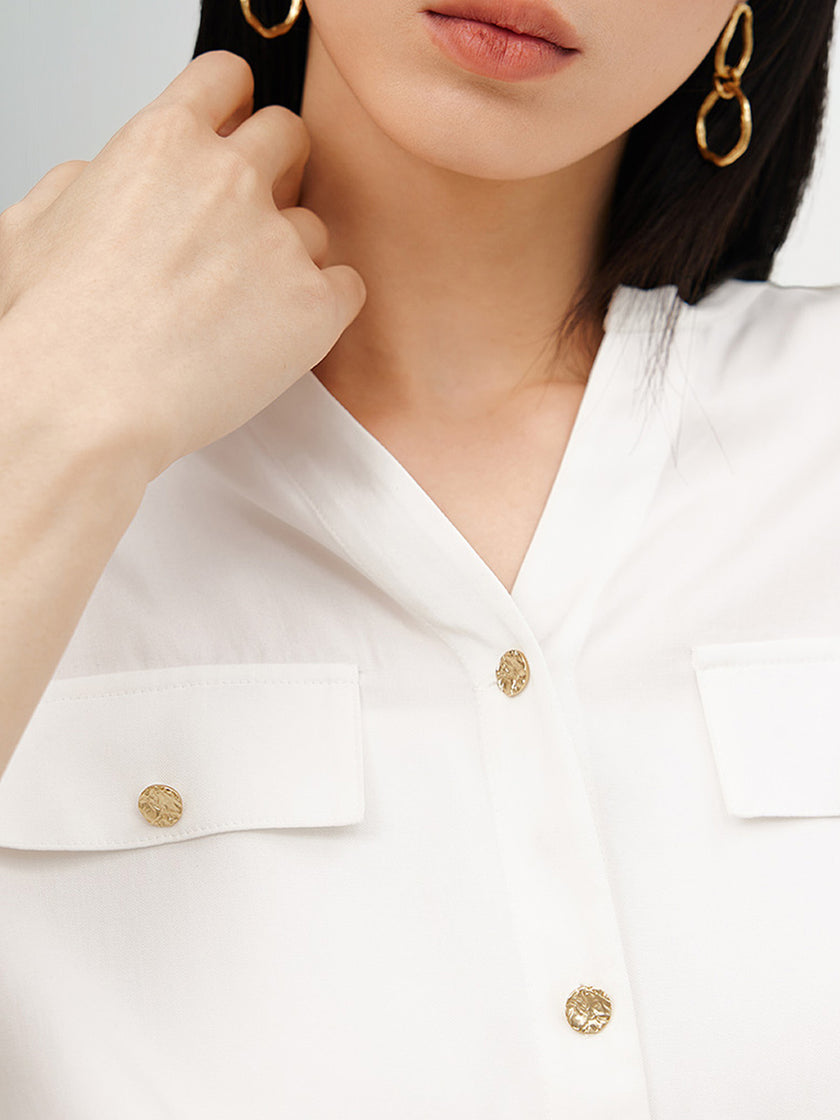 Blouse blanche à boutons