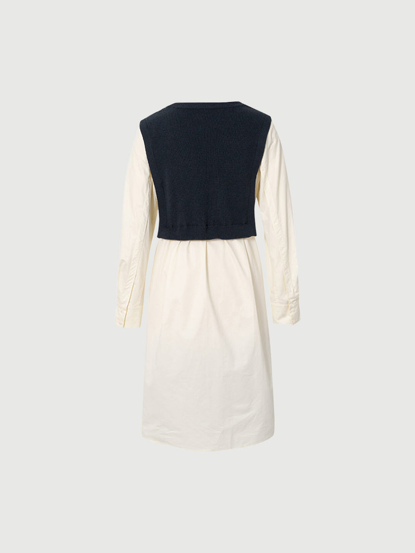 Black dress with round neck, long sleeves and belt