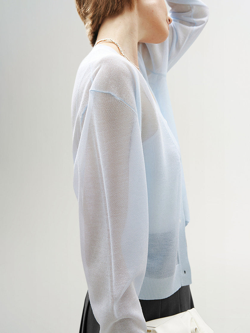 Cardigan bleu transparent