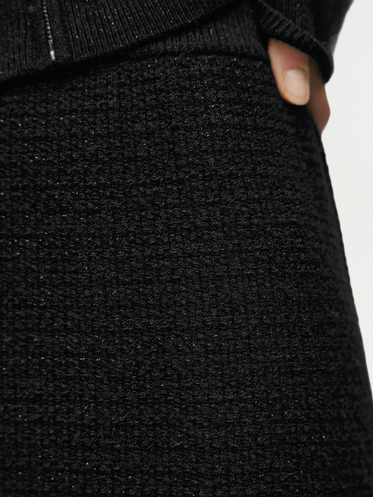 Black and shiny long knitted skirt