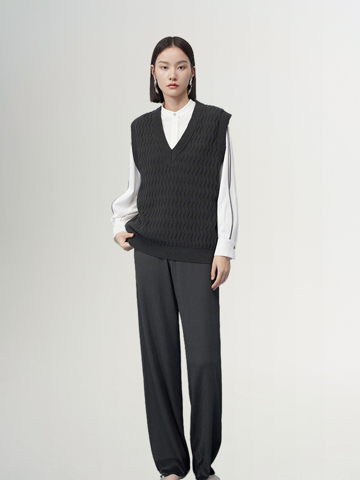 Dark gray V-neck knitted vest