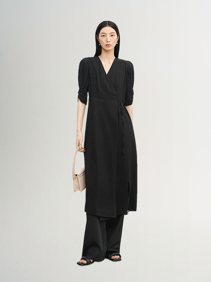 Black V-neck dress with puff sleeves