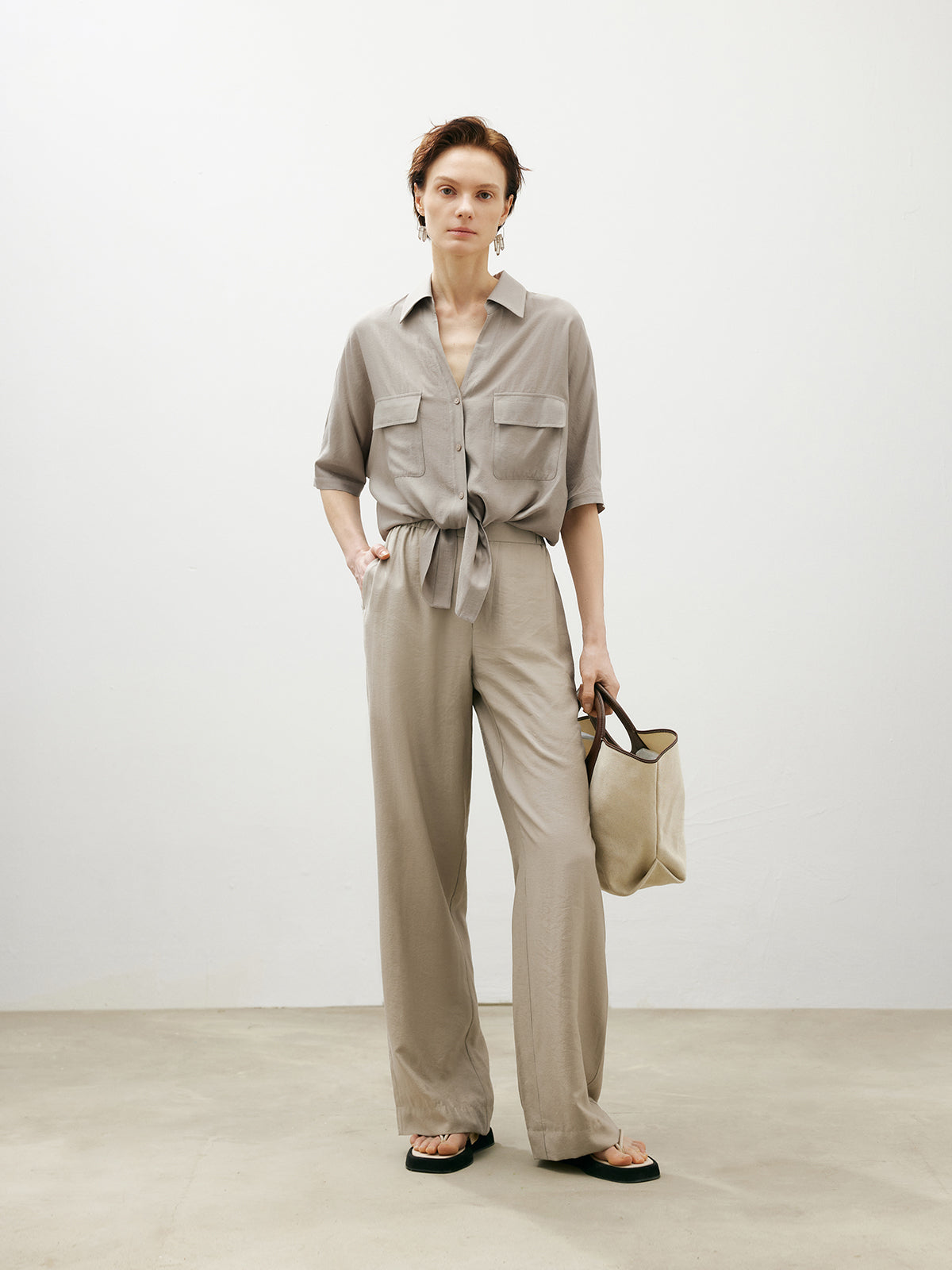 Beige shirt with bow