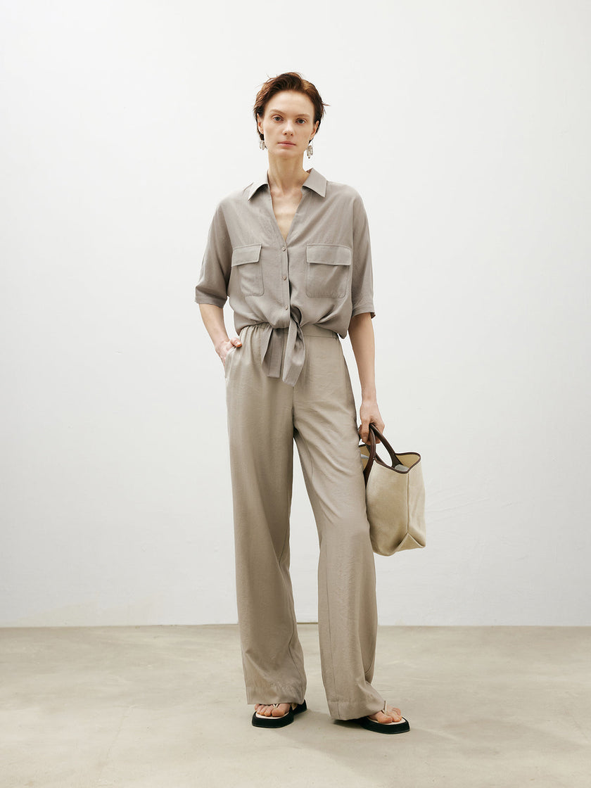 Beige shirt with bow