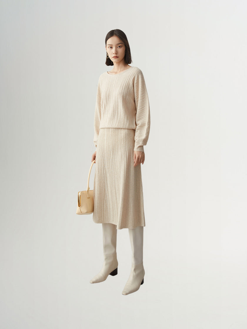 Pull en laine beige à col rond