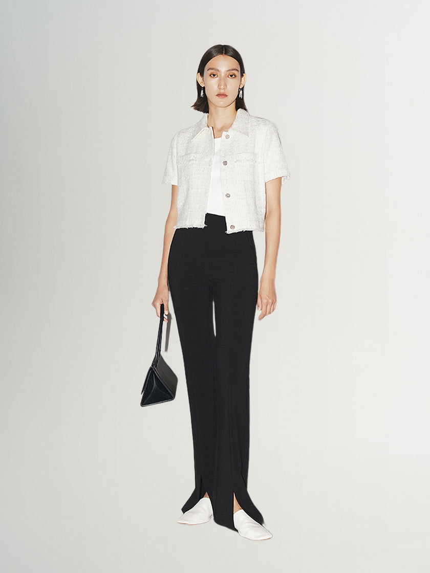 Black slim fit pants with a high waist and a slightly flared leg
