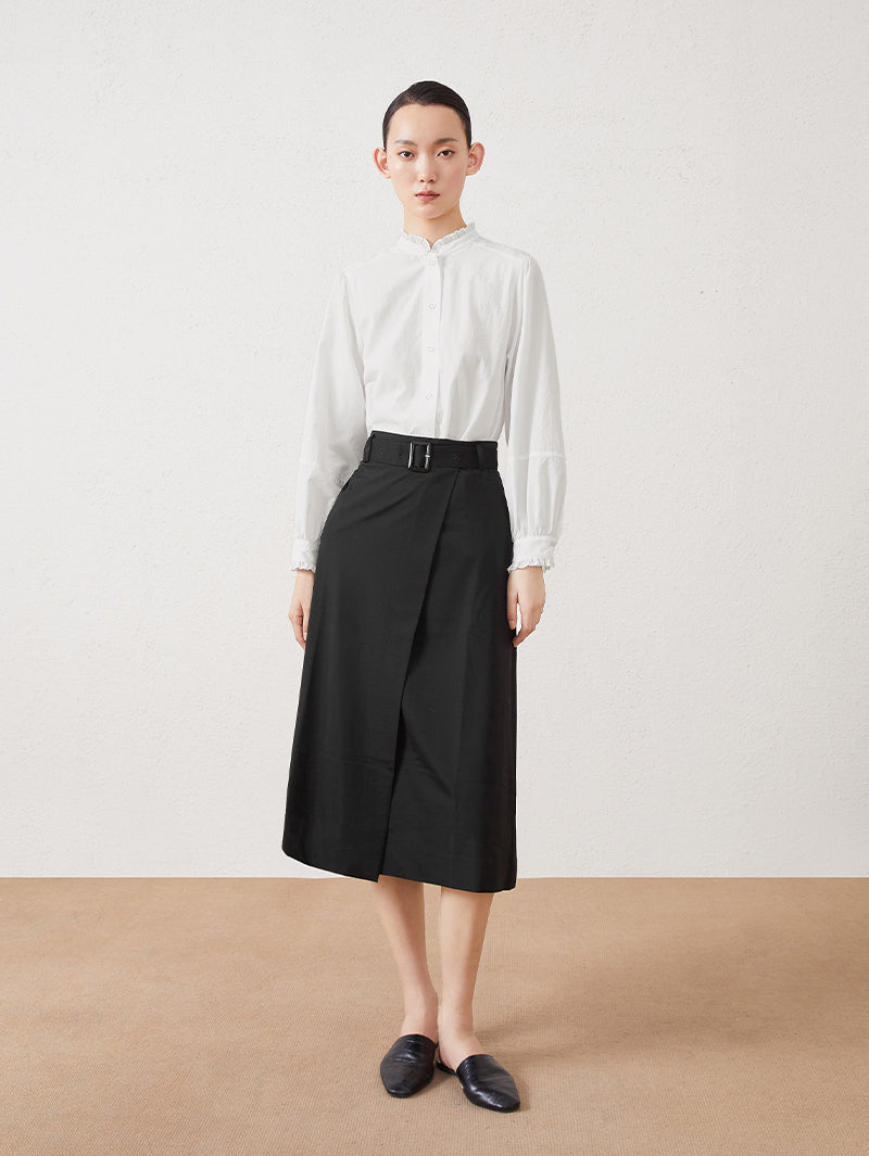 White long-sleeved blouse with pleated collar