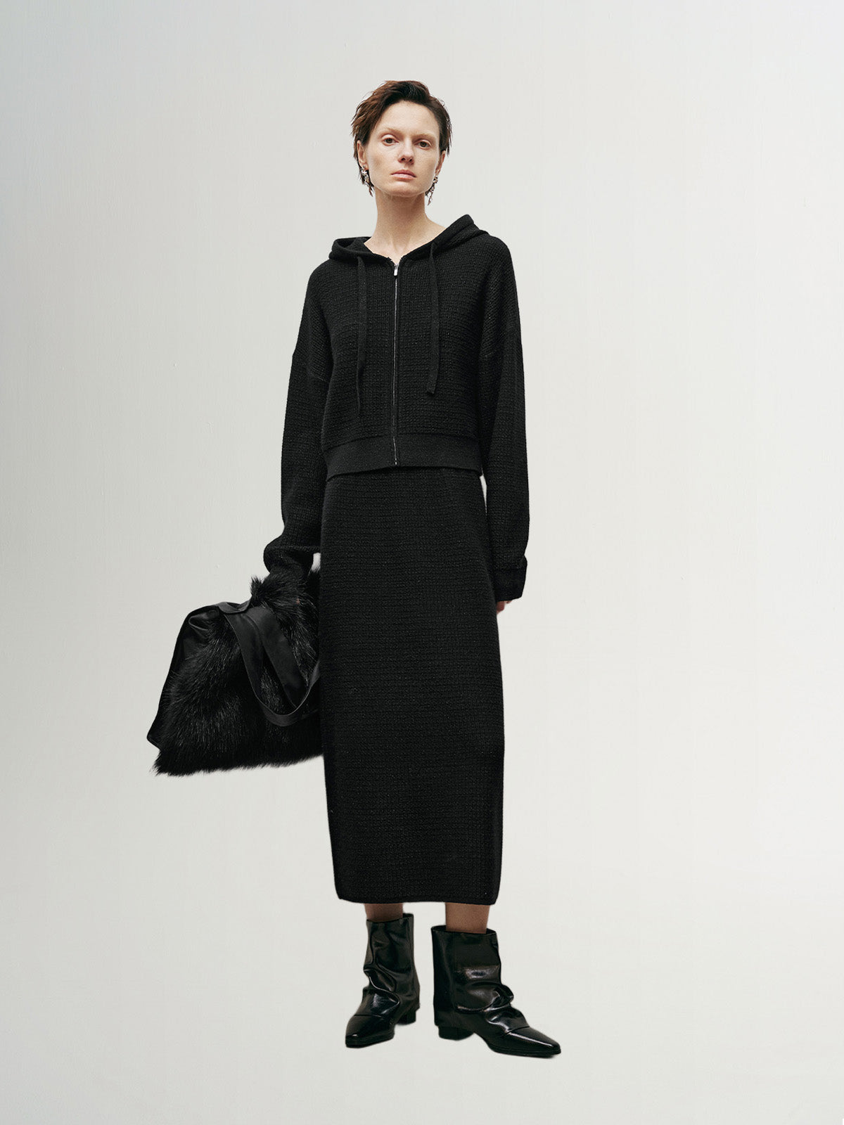 Black and shiny long knitted skirt