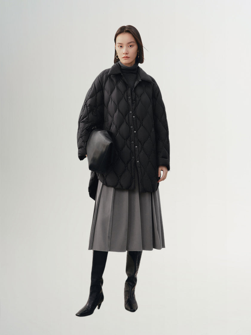 Black quilted hooded jacket with pattern
