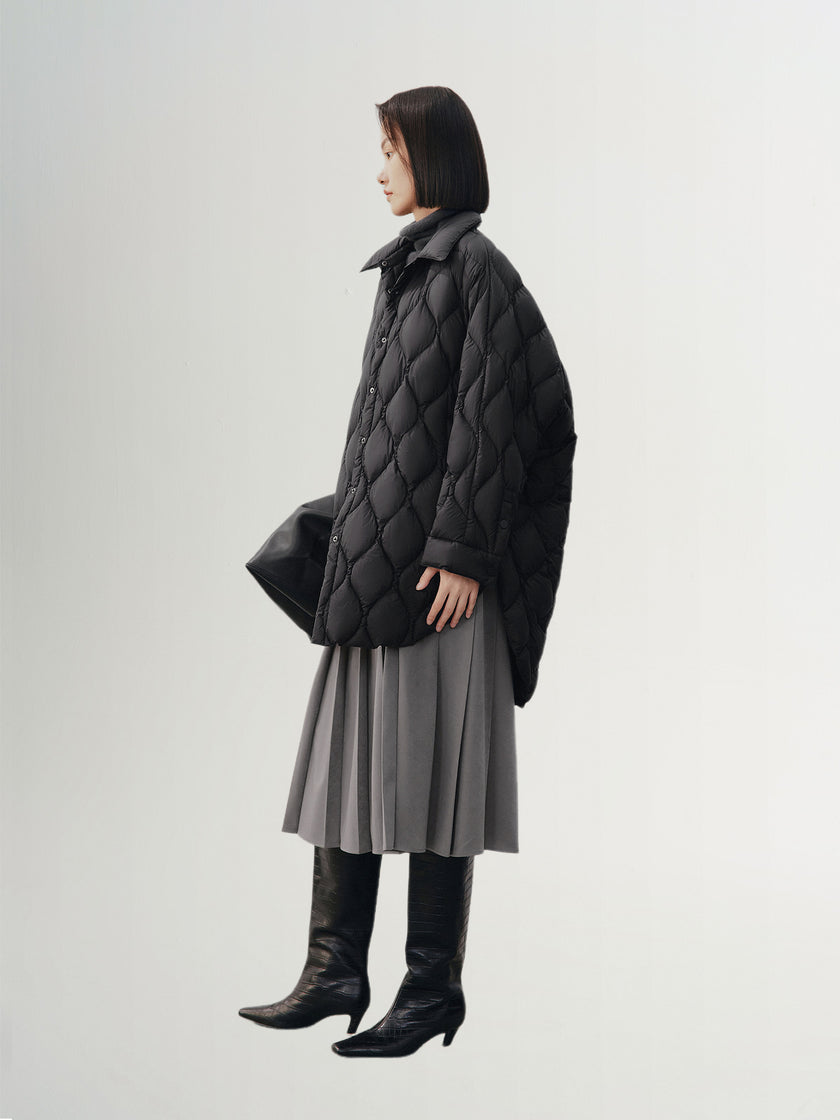 Black quilted hooded jacket with pattern