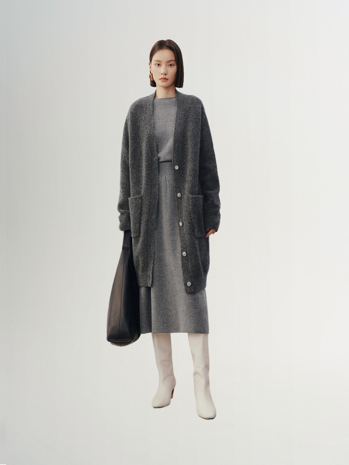 Dark gray sheepskin cardigan with puffed sleeves and V-neck