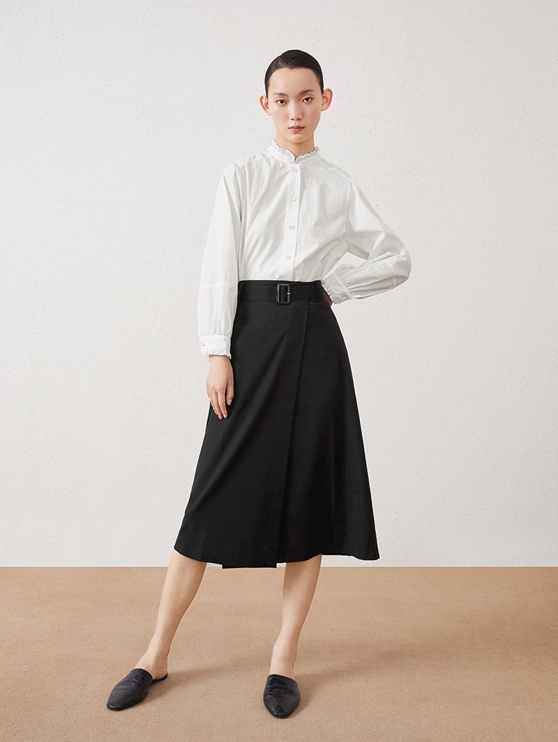White long-sleeved blouse with pleated collar