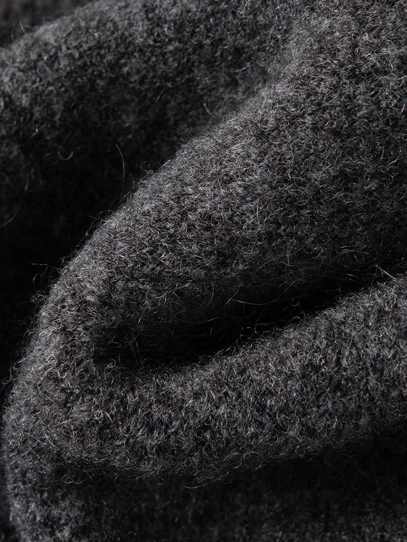 Dark gray sheepskin cardigan with puffed sleeves and V-neck