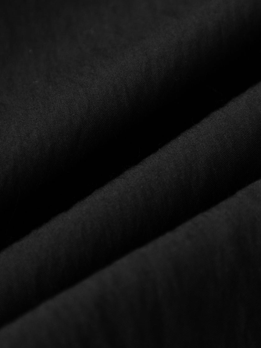 Pleated black dress