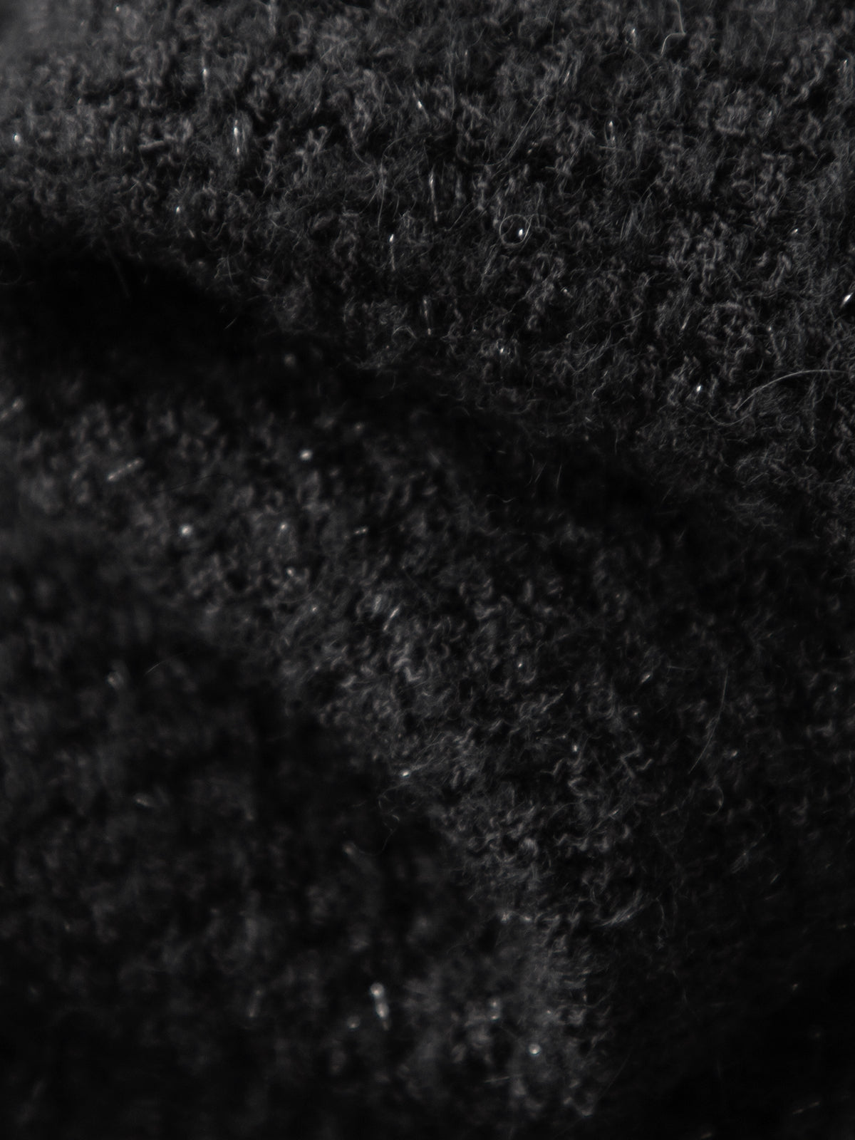 Black and shiny long knitted skirt
