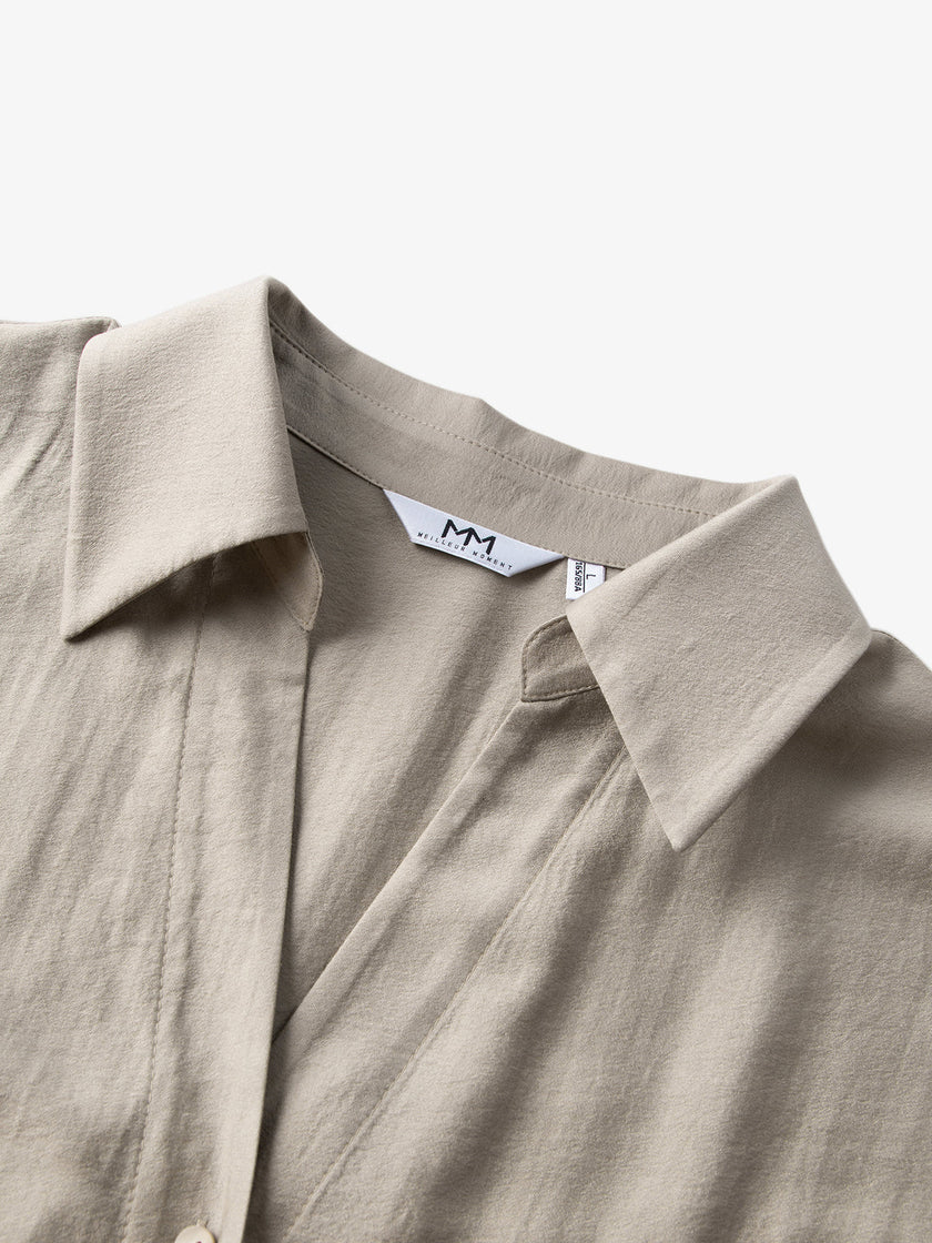 Beige shirt with bow