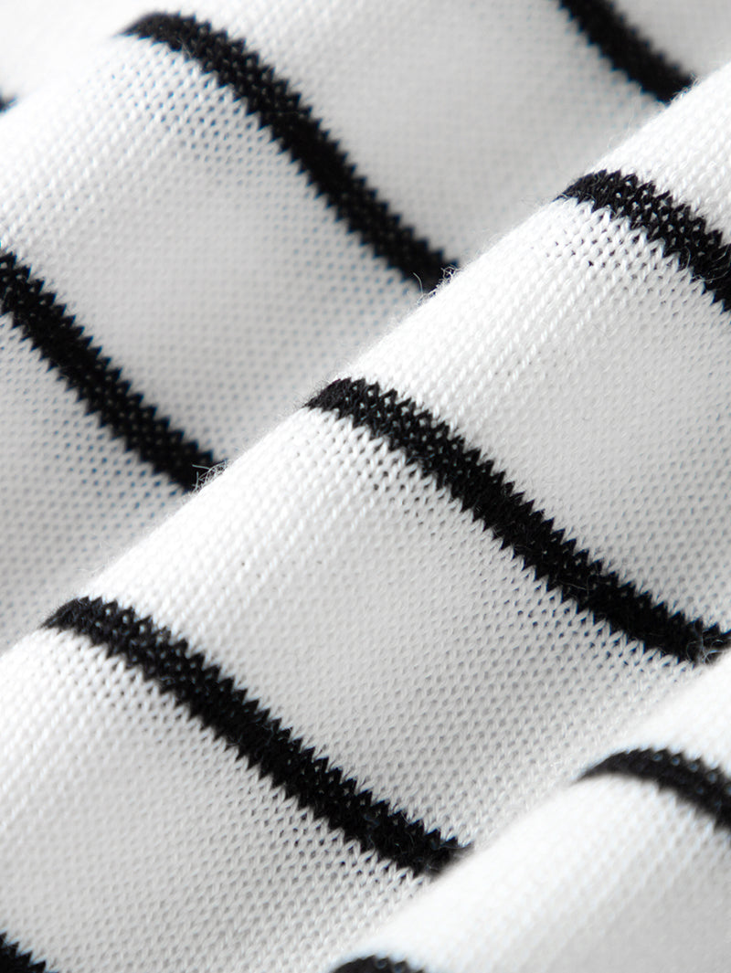 Black and white knitted top with round neck and short sleeves
