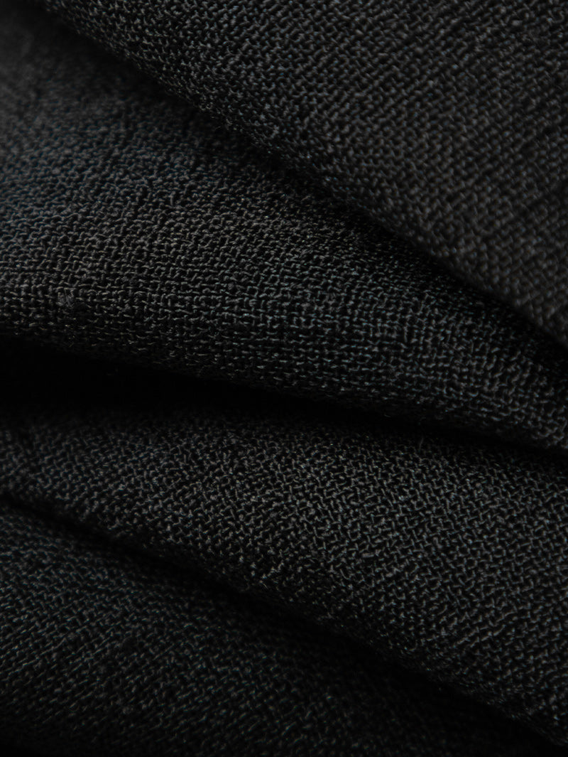 Black dress with round neck and long sleeves, high waist