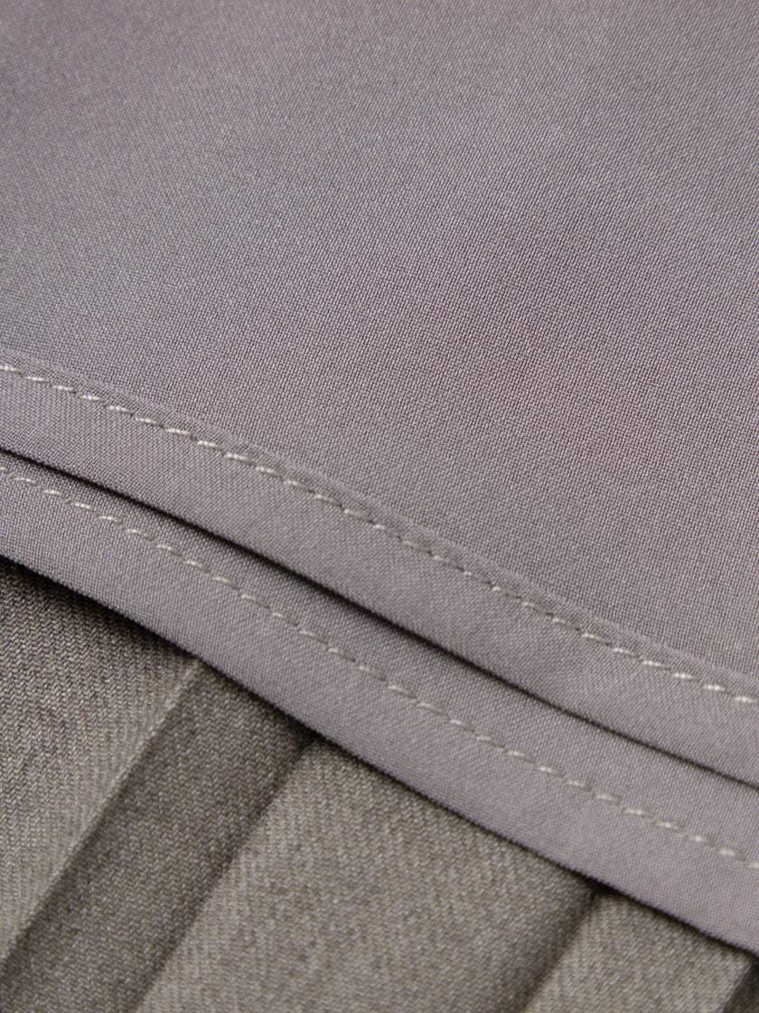 Long pleated skirt in gray wool