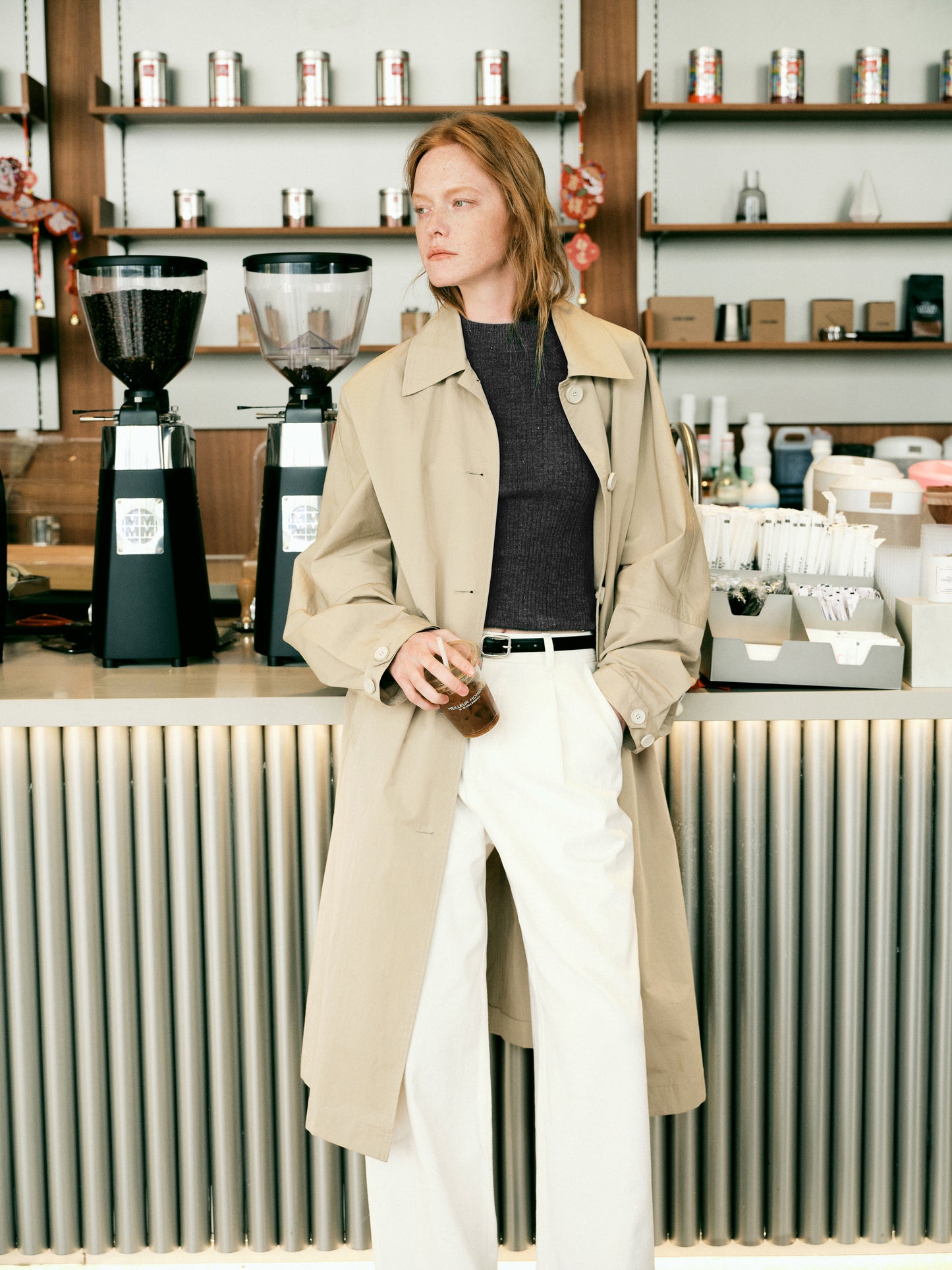 Cream wide leg pants with black belt