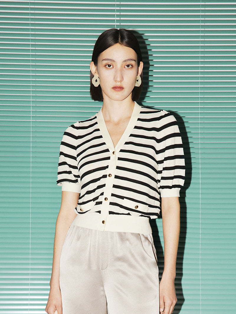 Top en tricot beige et noir à rayures