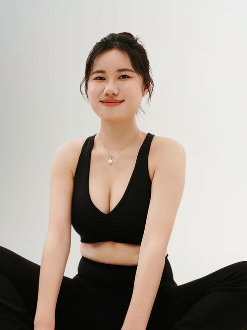 Load image 1 in gallery view. Black V-neck yoga bra