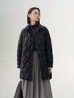 Black quilted hooded jacket with pattern