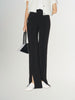 Black slim fit pants with a high waist and a slightly flared leg
