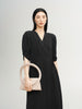 Black V-neck dress with puff sleeves