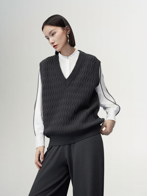 Load image 1 in gallery view. Dark gray V-neck knitted vest