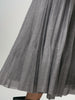Grey short skirt with elastic waist and pleated design