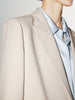 Light beige buttoned long sleeve blazer
