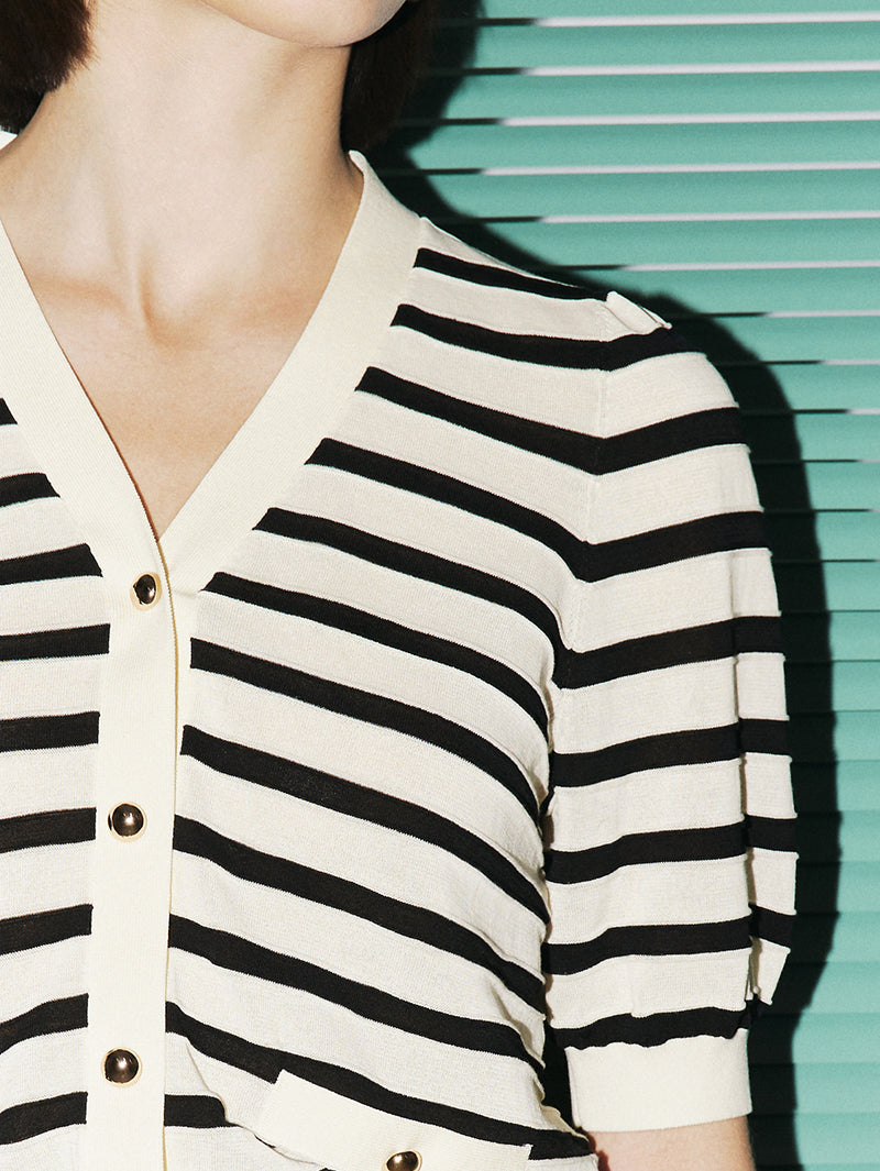 Top en tricot beige et noir à rayures