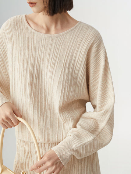 Pull en laine beige à col rond