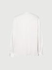 Chemise blanche à col en V et manches longues en soie