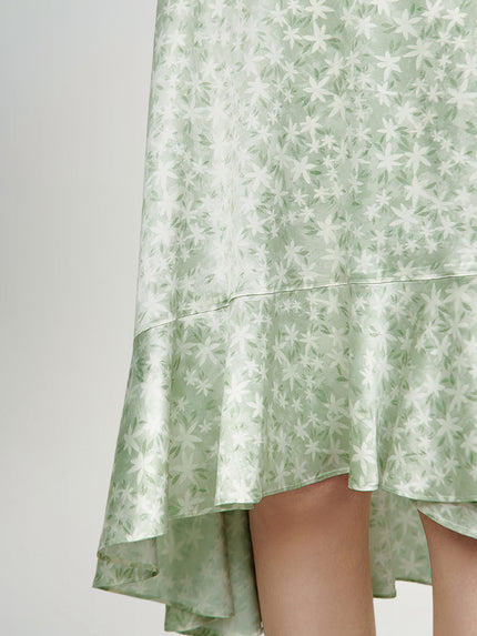 Mint green floral print dress with a v-neck, crossover cut and an irregular hem