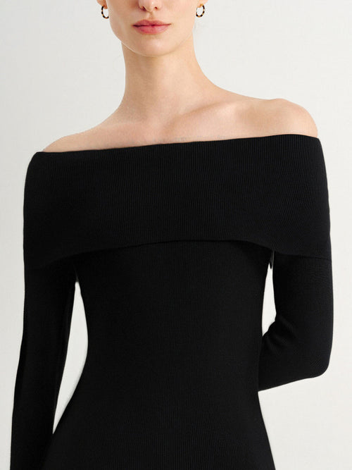 Load image 1 in gallery view. Black off-shoulder dress on a white background