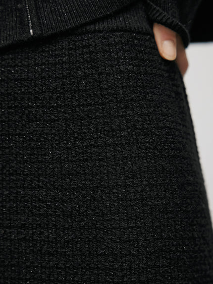 Jupe longue en tricot noire et brillante