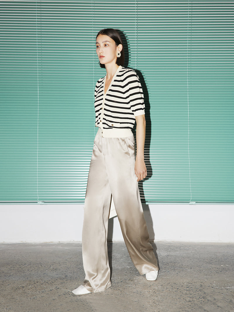 Top en tricot beige et noir à rayures