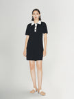 Black dress with white collar