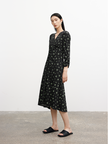 Black cotton mid-length dress with floral patterns