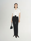 Black slim fit pants with a high waist and a slightly flared leg