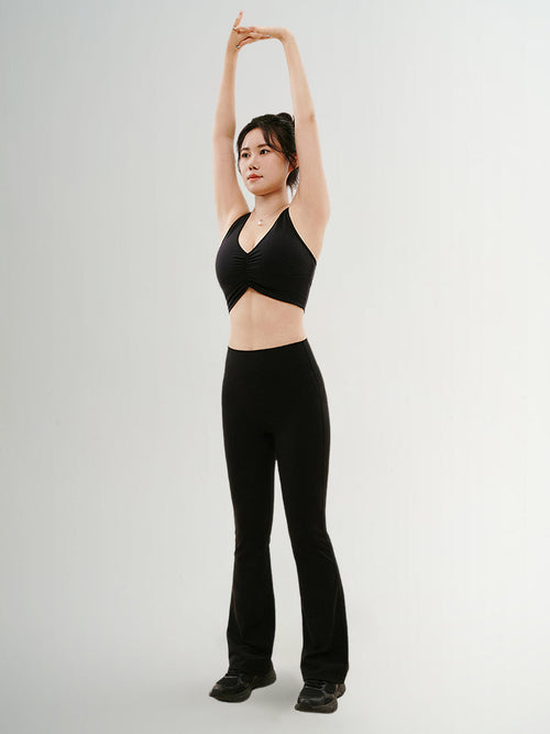 Load image 1 in gallery view. Black V-neck yoga bra