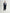 Navy blue mid-length trench coat with button fastening and belt