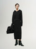 Black and shiny long knitted skirt